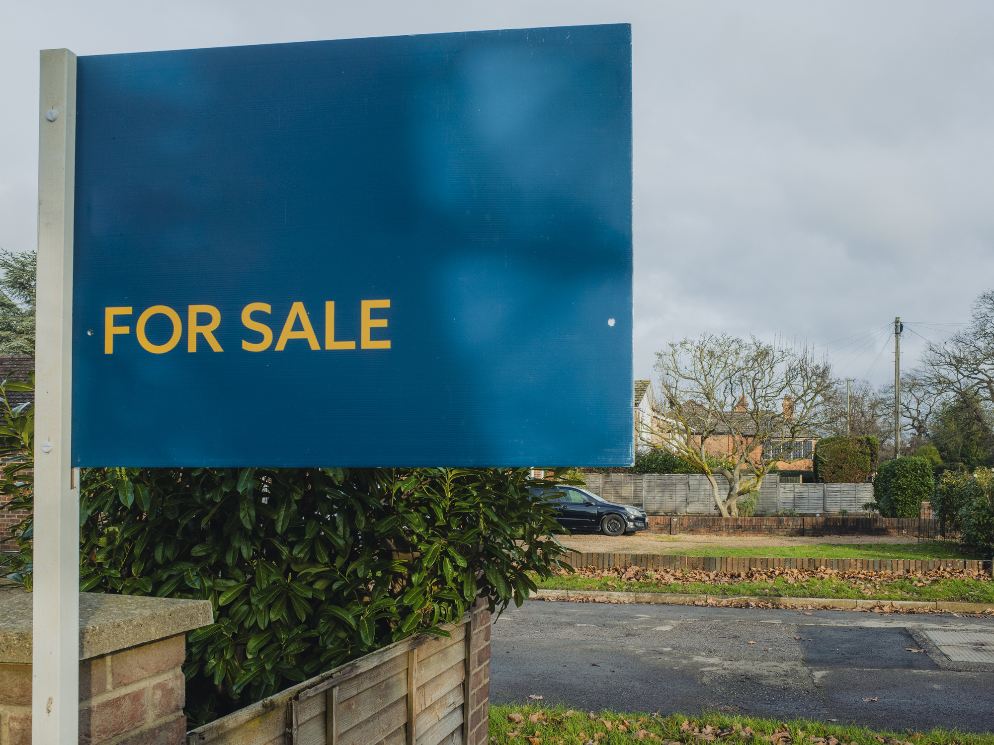 House for sale sign outside of a property.