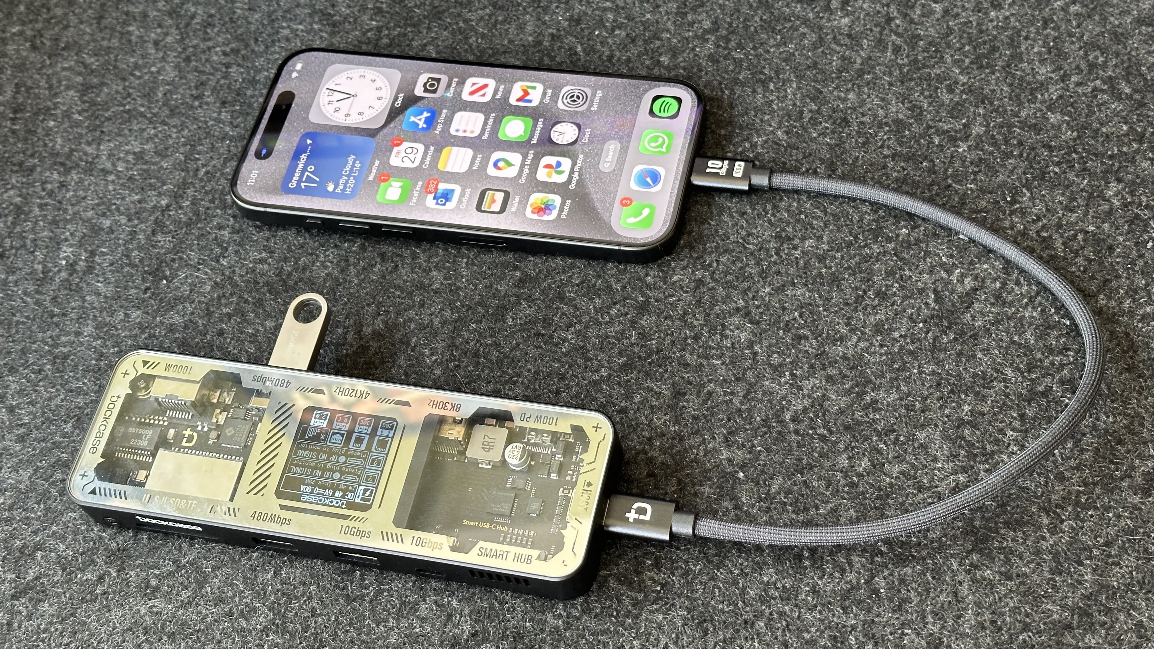 iPhone 15 Pro plugged into a USB-C dock