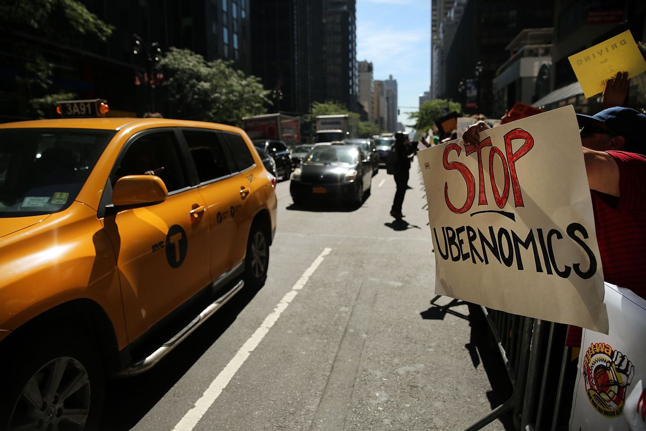 NYC taxi drivers rally against Uber