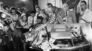 Journalists meet Baker, on the left, and Able, on the right, during a news conference held on June 1, 1959, after the two monkeys survived spaceflight.