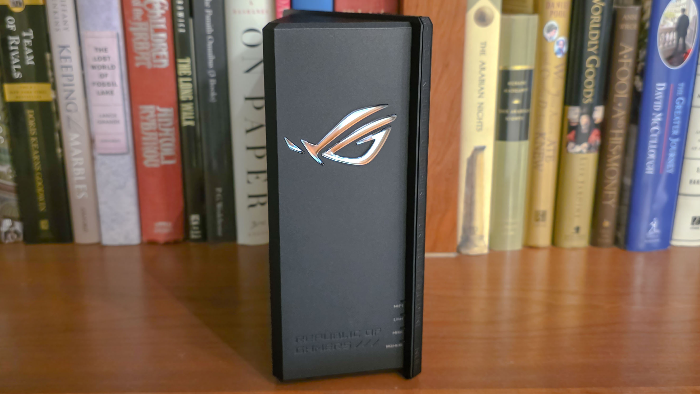 Asus ROG Strix GS-BE18000 gaming router on a table