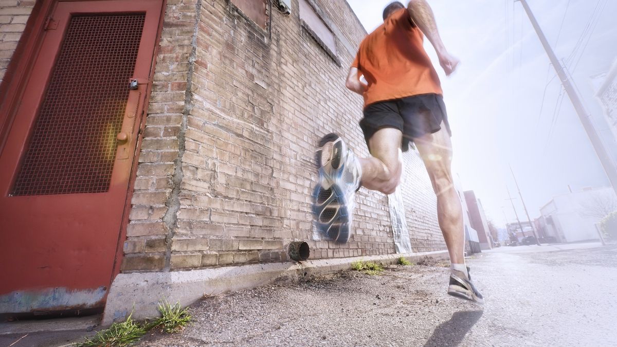 Man running up road