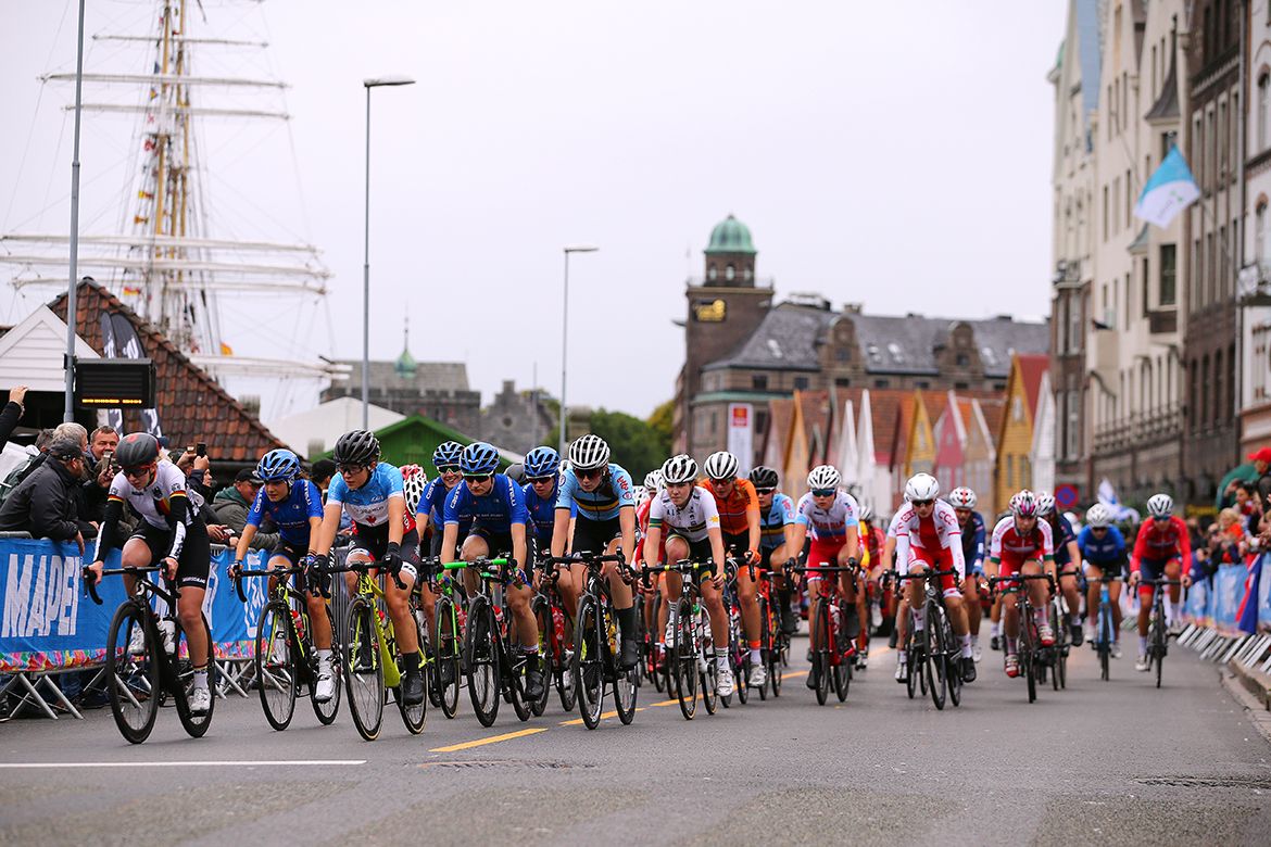 Germany and Canada sit in front of the peloton