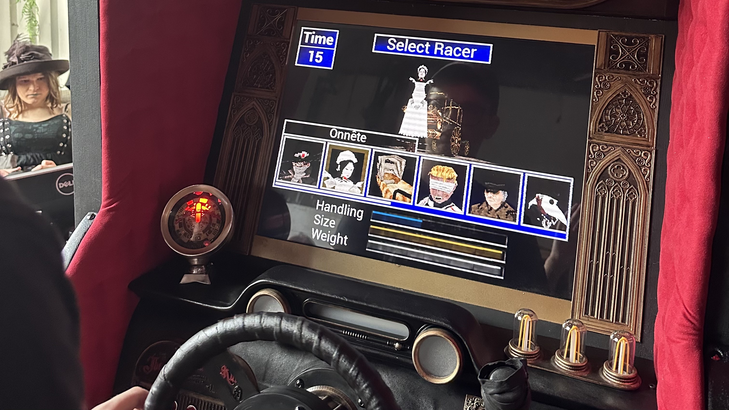 A photo shows the finished Nightmare Kart arcade cabinet presenting a &quot;select racer&quot; screen