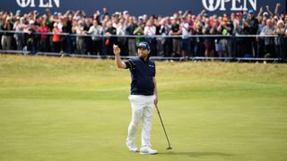 Branden Grace of South Africa acknowledges the crowd on the 18th green after shooting a 62 the lowest round in major championship history during the third round of the 146th Open Championship at Royal Birkdale