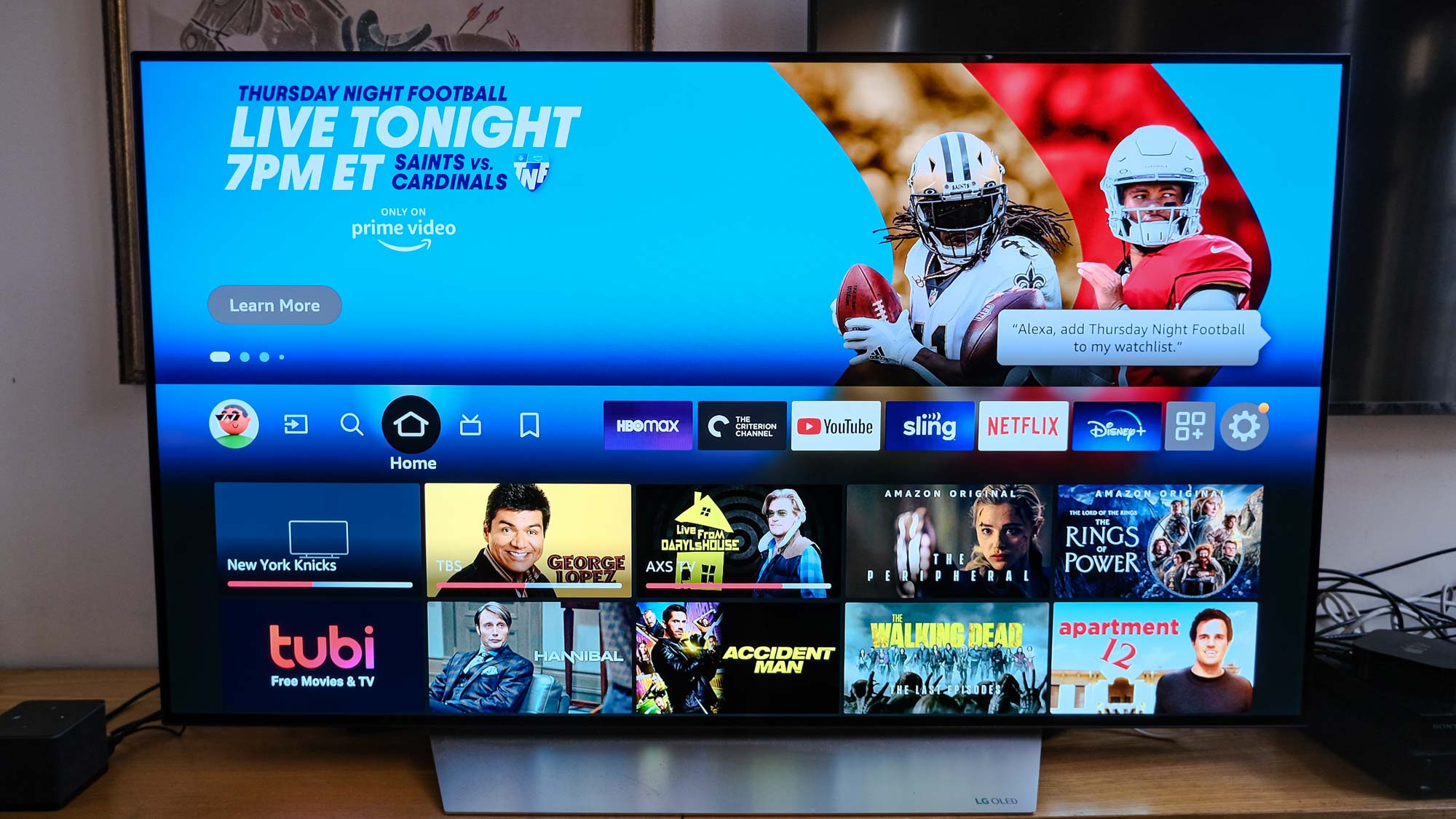 A Thursday Night Football ad on the Fire TV home screen on a TV connected to the Fire TV Cube (2022)