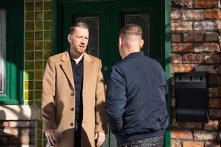 Sean and Lawrence talk outside the Rovers in Coronation Street
