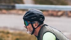 Paul Brett riding in the Kask Protone helmet on the Bealach na Ba in Scotland