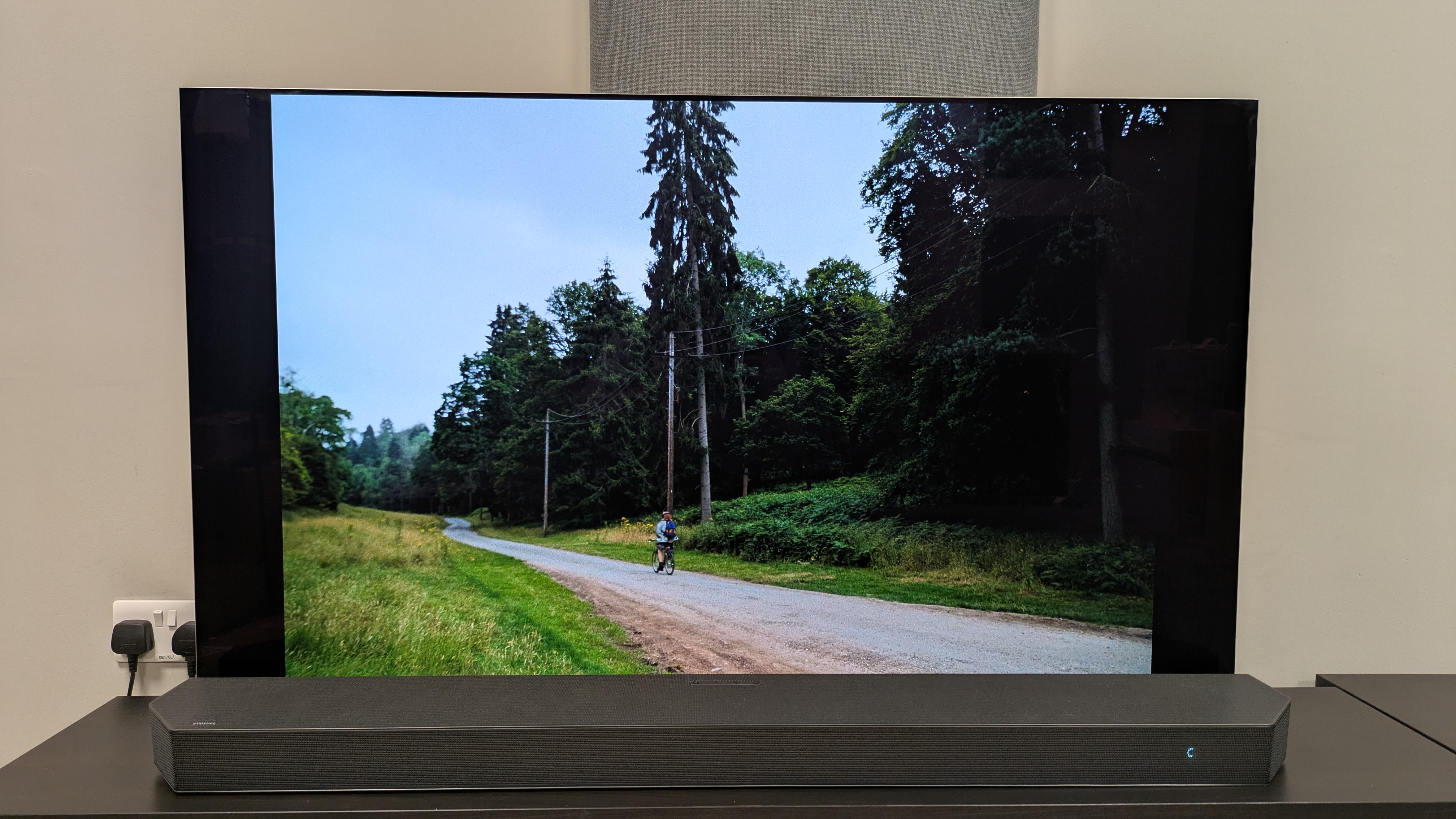 Bugonia 4K Blu-ray on LG G5 showing Teddy on his bike riding towards woods 