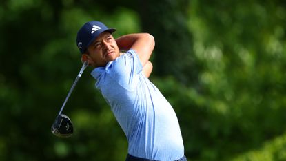 Xander Schauffele plays his shot from the fourth tee during the first round of the PGA Championship.