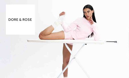 Dore and Rose logo top left with a model posing on an ironing board