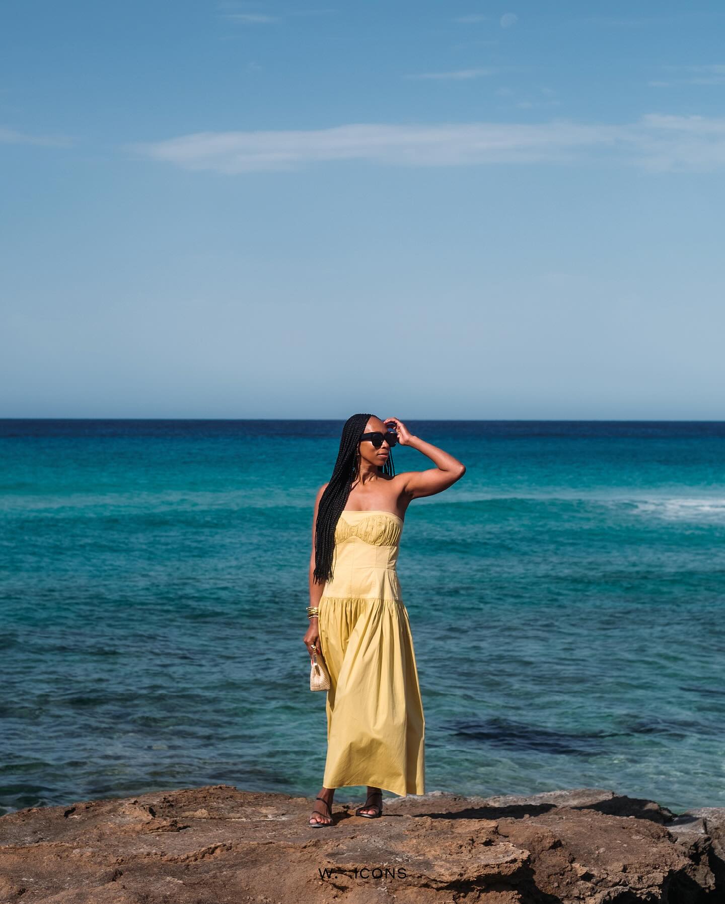 An image of @thandima wearing one of the key summer dress trends for 2025.