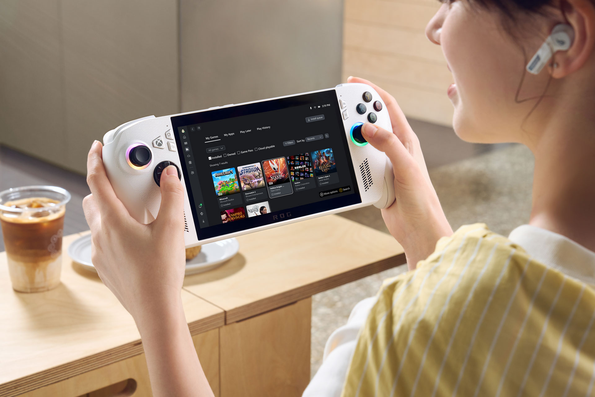an image of the ROG Xbox Ally in the hands of a woman