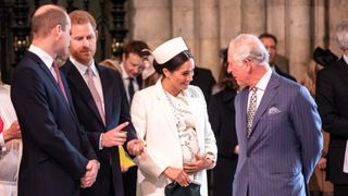 Prince Charles greets Meghan Markle and Prince Harry