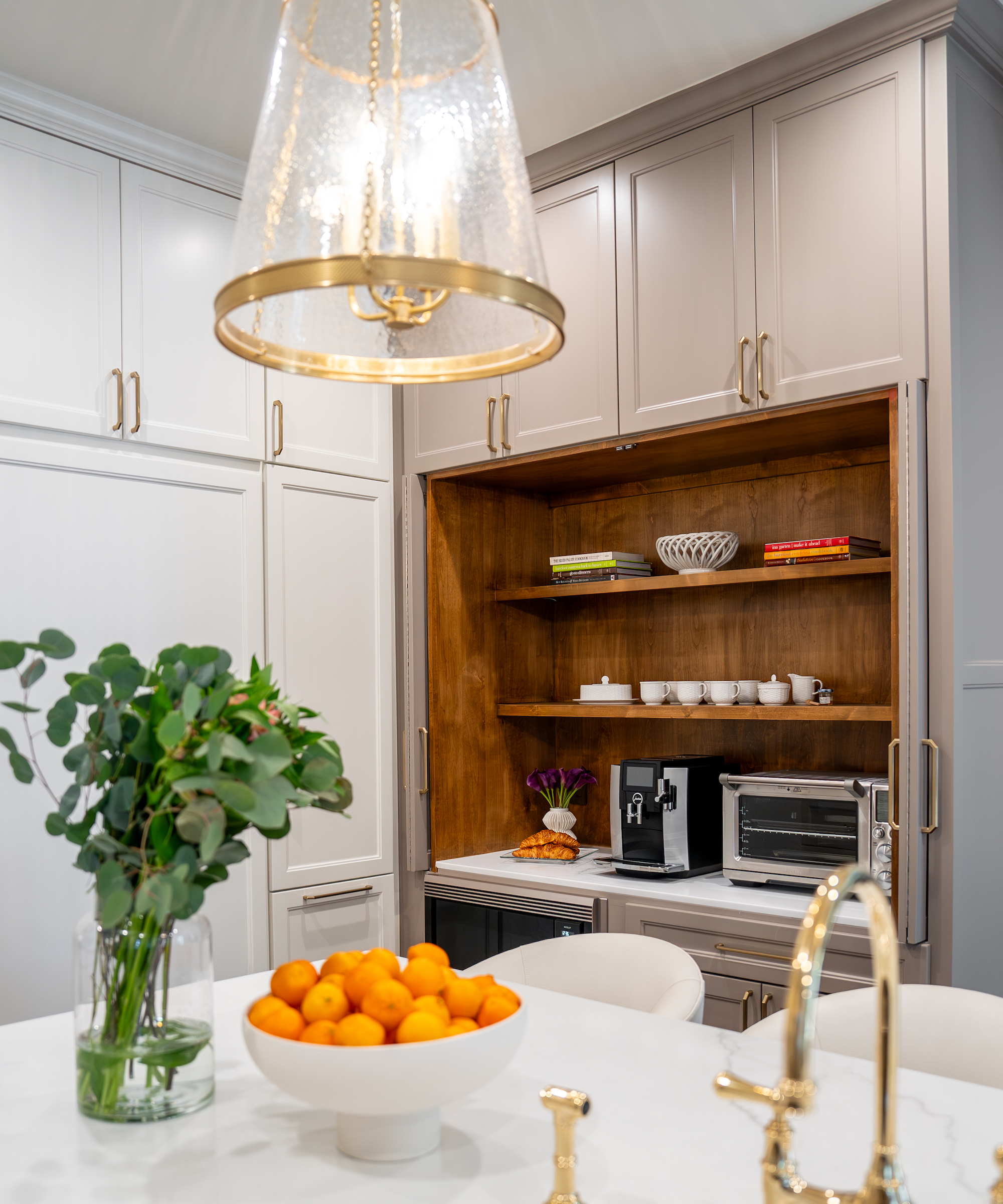 kitchen storage with open appliance garage