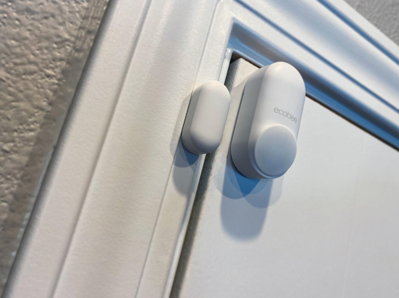 ecobee SmartSensor installed on an interior door
