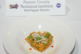 The winning dish is a red pepper risotto from Passaic County Technical Institute in Wayne, New Jersey. The entrée will be processed for flight and enjoyed by space station astronauts next year.