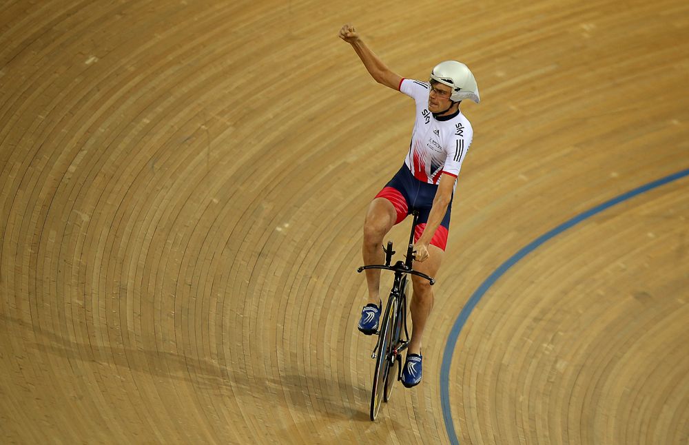 Andrew Tennant of Great Britain celebrates after taking bronze in the Men's Individual Pursuit