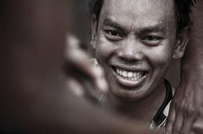 A happy Anuar Manan (Terengganu Cycling Team) from Malaysia after his win into Chengmai.