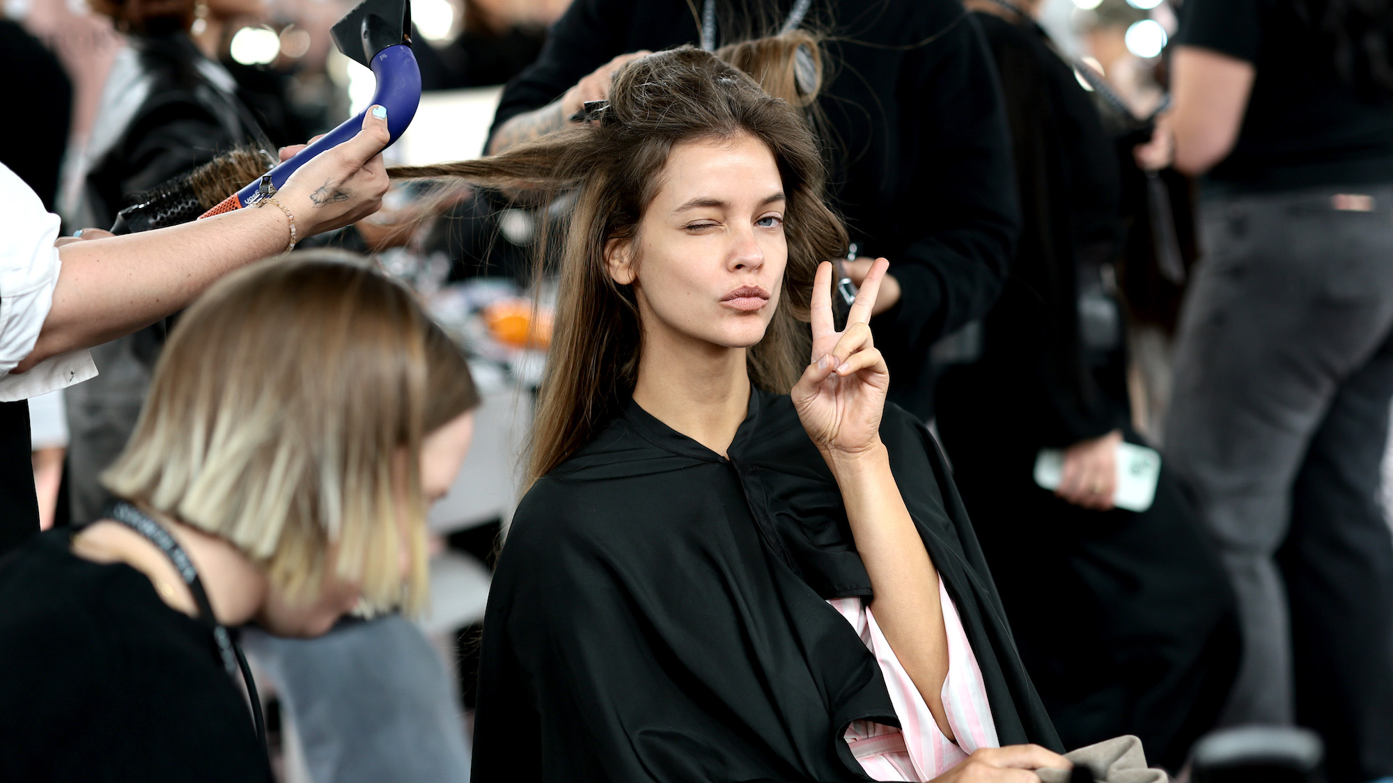 Barbara Palvin backstage at the Victoria's Secret Fashion Show 2025 with hair blow dry