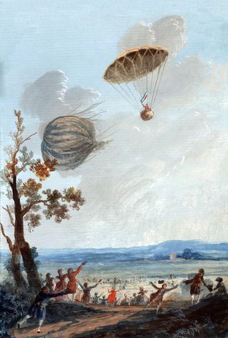 In 1797, balloonist Andre-Jacques Garnerin rose 2,000 feet (610 m) above Parc Monceau in Paris in a hot-air balloon, cut the balloon free and descended back to the ground attached to an umbrellalike silk parachute.