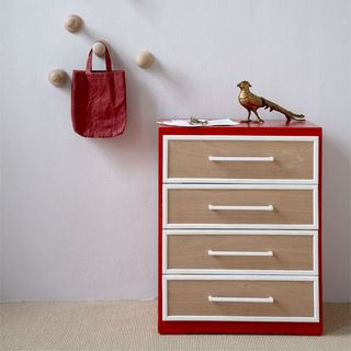 wooden drawers and white wall