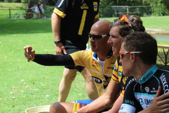 One fan takes a selfie with Serge Pauwels and Nicolas Dougall.