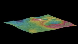NASA's Dawn spacecraft provided image used to produce this view of Ceres featuring a tall conical mountain. Image released Sept. 30, 2015.