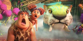 The Croods 2: A New Age the kids look shocked next to their family pet