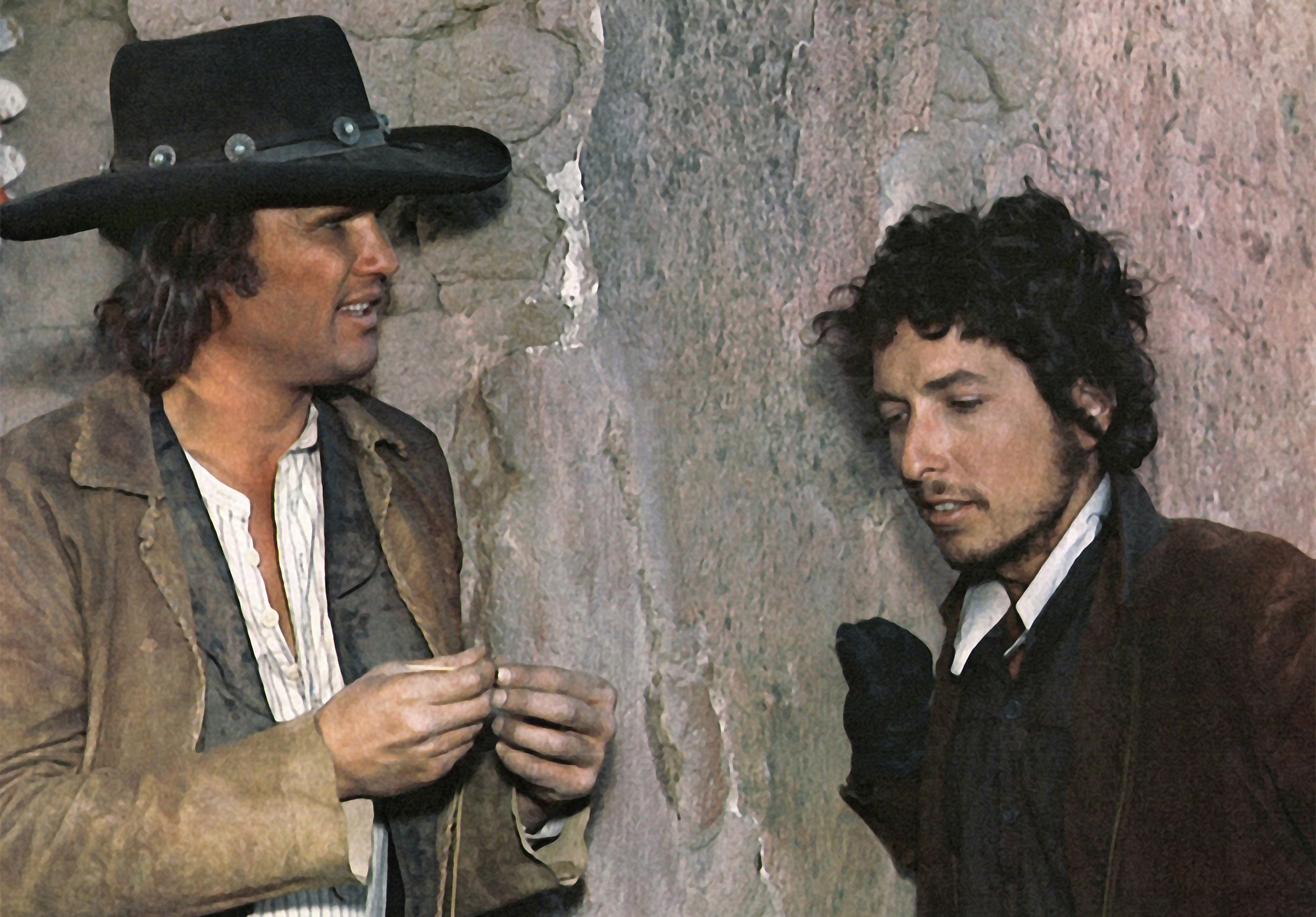 Kris Kristofferson and Bob Dylan in a scene from the 1973 Sam Peckinpah western film &#039;Pat Garrett and Billy the Kid&#039;.