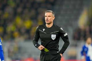 referee Slavko Vincic looks on during the UEFA Champions League quarter-final second leg match between Borussia Dortmund and Atletico Madrid at Signal Iduna Park on April 16, 2024 in Dortmund, Germany. (Photo by Alex Gottschalk/DeFodi Images via Getty Images)