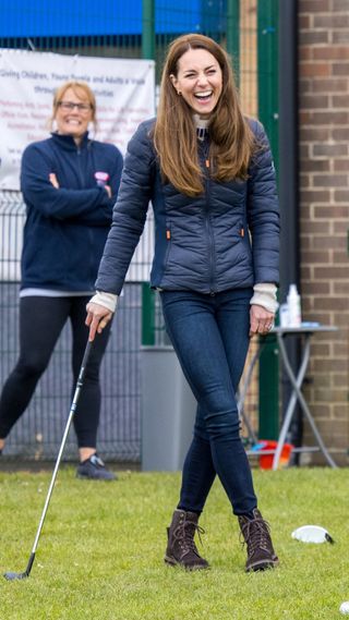 Kate Middleton playing golf
