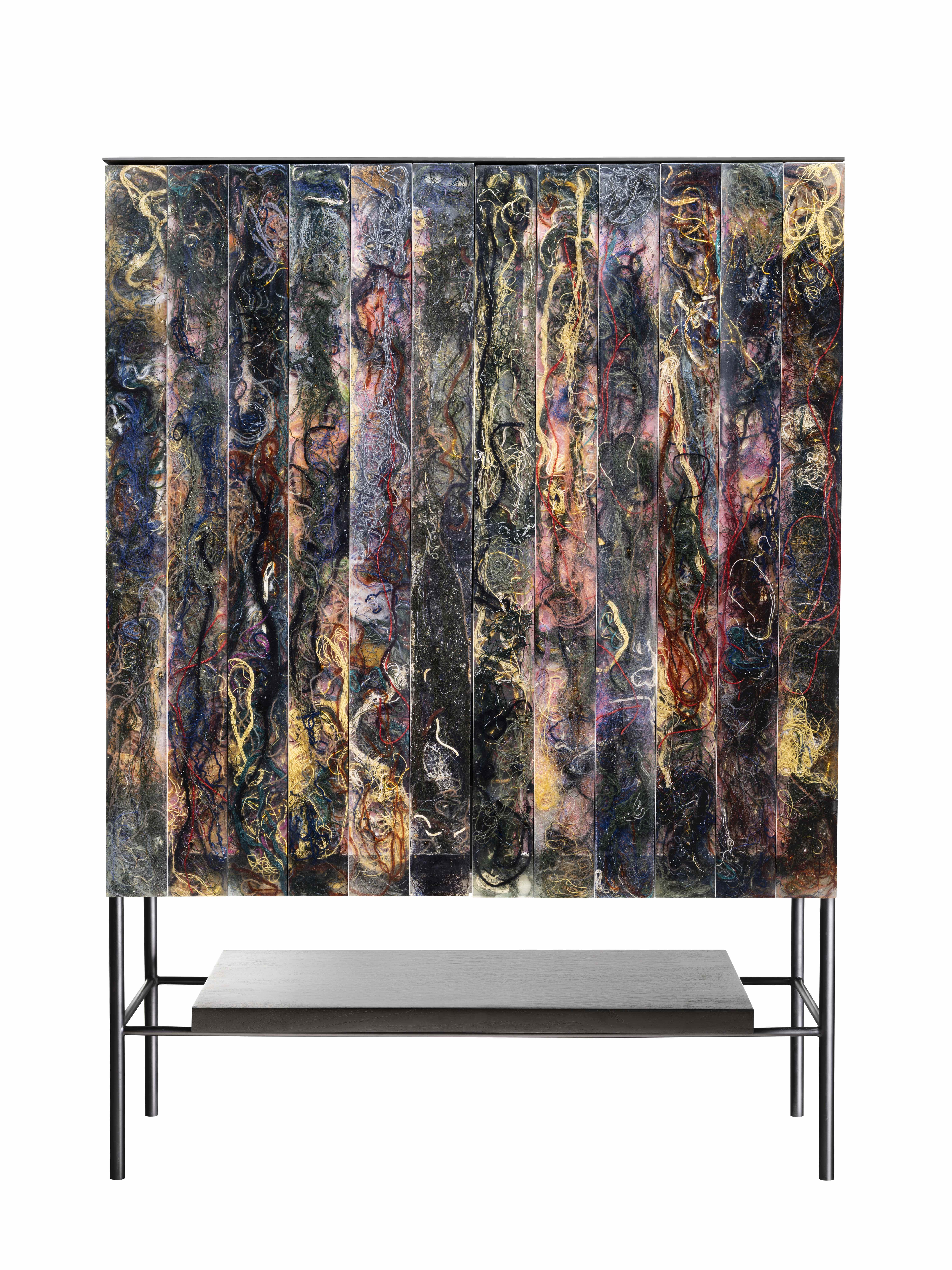 cabinet made using discarded yarns