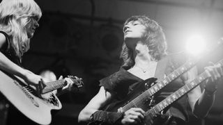 Nancy Wilson (left) and Ann Wilson performing in Portland, Oregon, 1977