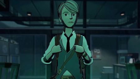 A young man wearing a backpack in a darkened room