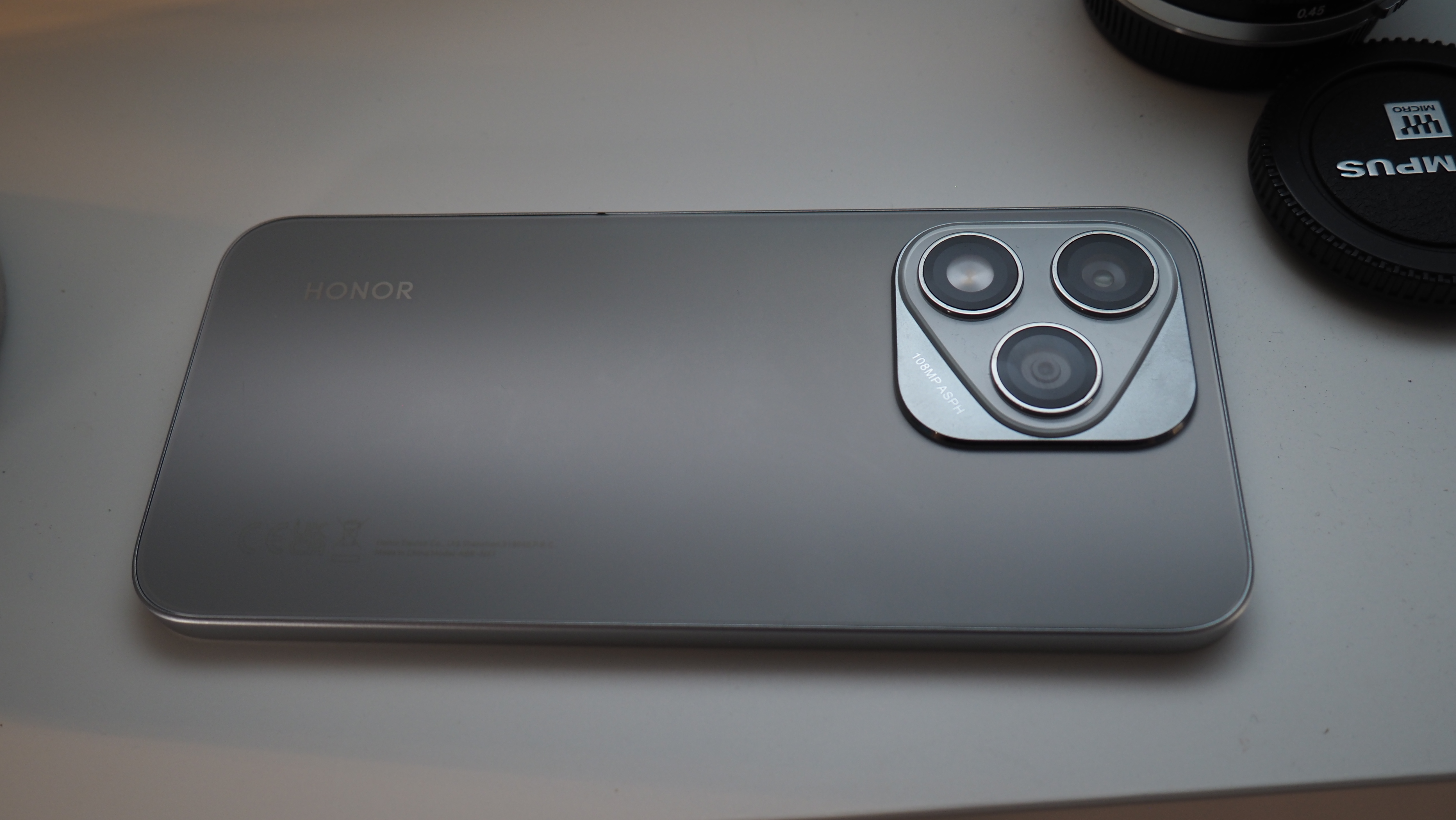A silver Honor 400 Lite camera phone