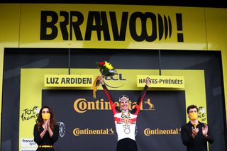 LUZ ARDIDEN FRANCE JULY 15 Tadej Pogaar of Slovenia and UAETeam Emirates celebrates at podium during the 108th Tour de France 2021 Stage 18 a 1297km stage from Pau to Luz Ardiden 1715m LeTour TDF2021 on July 15 2021 in Luz Ardiden France Photo by Michael SteeleGetty Images