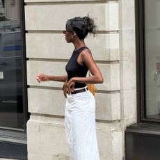 An image depicting a messy bun, courtesy of @_livmadeline