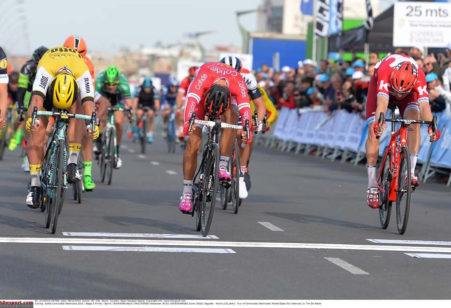 Dylan Groenewegen and Nacer Bouhanni dive for the line