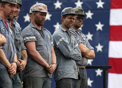 Coal miners attend a political rally in Ohio in 2012.
