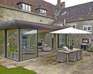 Conservatory ideas with glass window and door