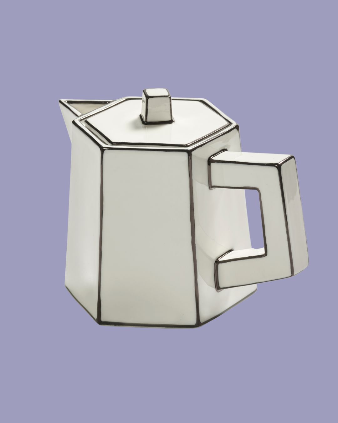 Annebet Philips Carte Blanche Porcelain Tea Pot against dark purple background.
