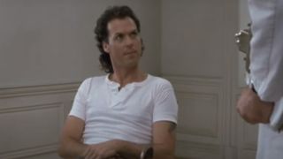 Michael Keaton as Billy Caulfield sporting a stare in The Dream Team