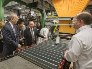 At Bally Ribbon Mills, engineers are weaving a material that will be used on NASA's Orion human spacecraft. Here, NASA employees take a tour of the Bally Ribbon Mills facilities.
