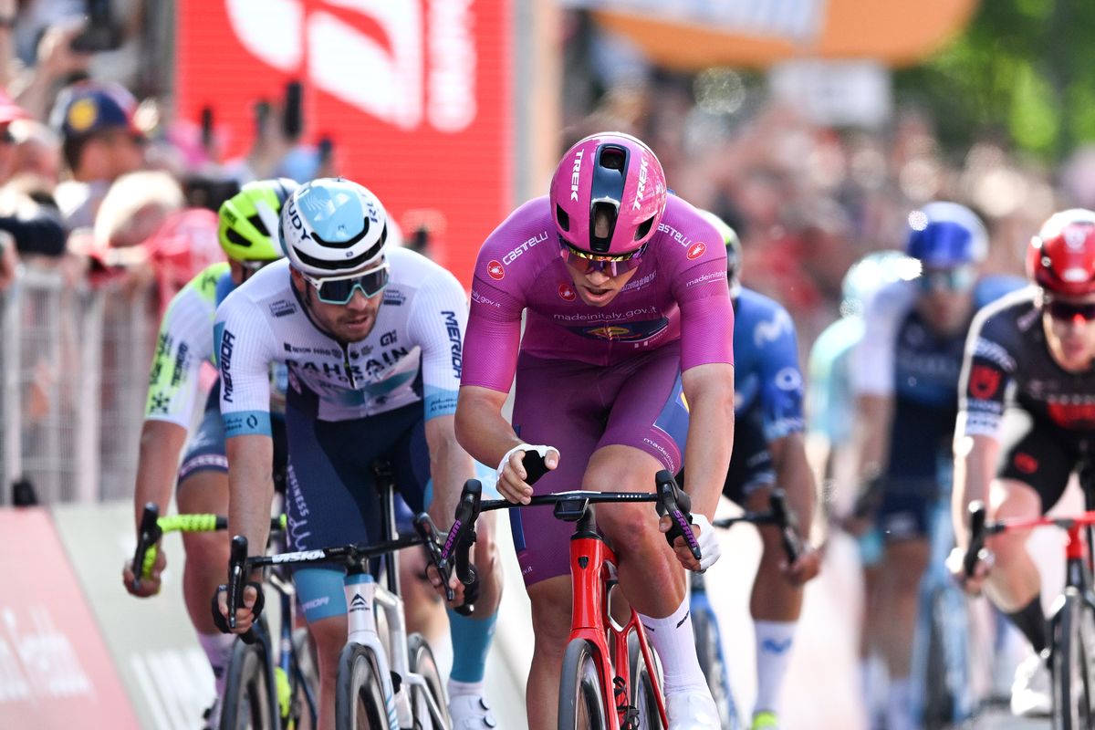 LUCCA, ITALY - MAY 08: (L-R) Phil Bauhaus of Germany and Team Bahrain - Victorious, Jonathan Milan of Italy and Team Lidl - Trek - Purple Points Jersey and Caleb Ewan of Australia and Team Jayco AlUla sprint at finish line during the 107th Giro d&#039;Italia 2024, Stage 5 a 178km stage from Genova to Lucca / #UCIWT / on May 08, 2024 in Lucca, Italy. (Photo by Tim de Waele/Getty Images)