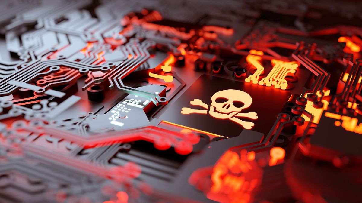 Abstract image showing a red circuit board containing a square chip with a glowing skull etched into it