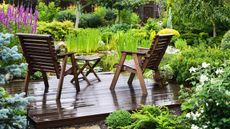 how much does decking cost: two chairs on deck in garden