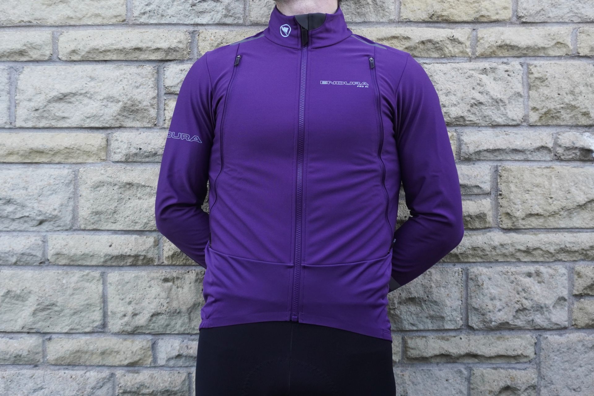 Image shows a rider wearing the Endura Pro SL 3-Season which is one of the best winter cycling jackets.