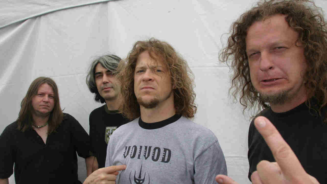 Voivod posing for a photograph in 2003