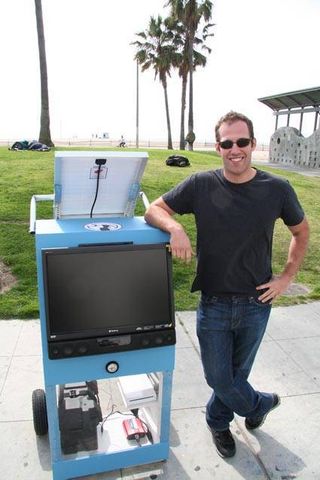 THG video producer Ben Meyer and the solar powered Wii.
